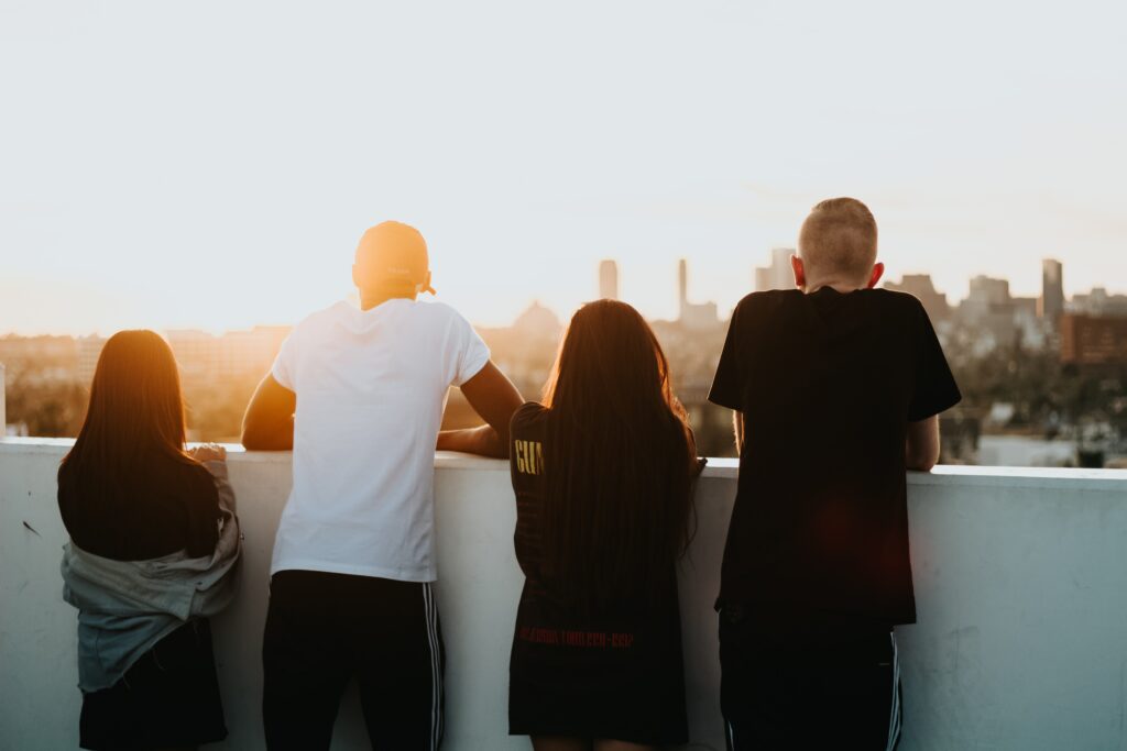 a group of young adults on a rooftop